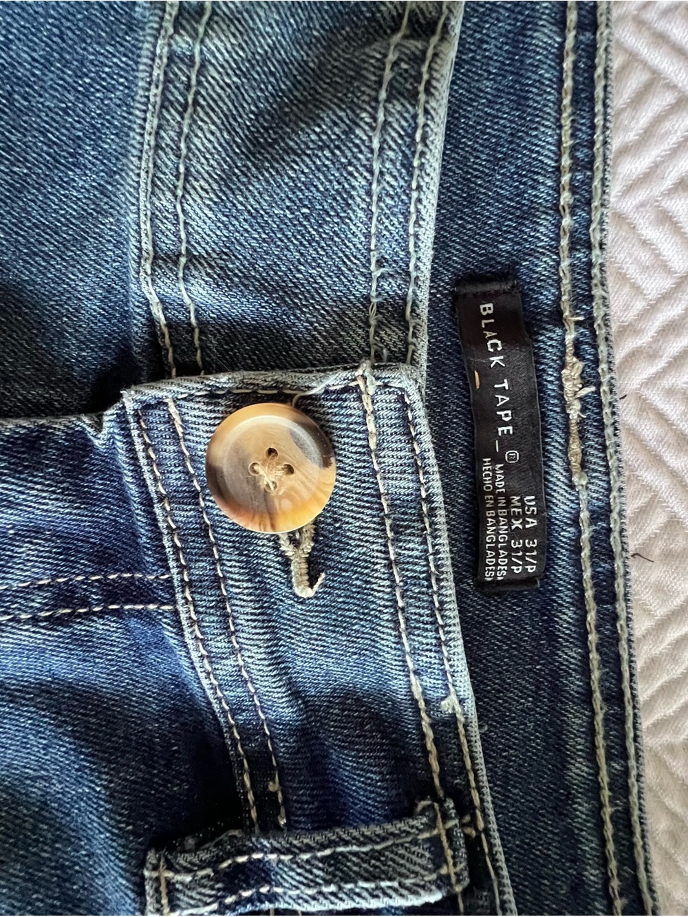 Black Tape_ Medium Blue Wide-Leg Jeans with Button Detail
